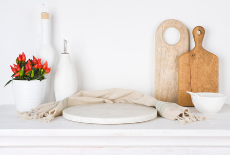 Marble podium on kitchen table with space for product displayの写真素材