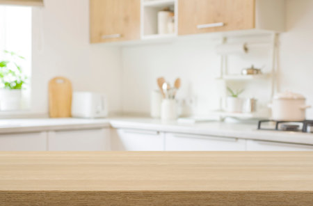 Kitchen table top for product display with blurred modern interiorの写真素材