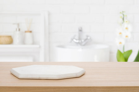 Marble podium for bathing product display on blurred bathroom backgroundの写真素材