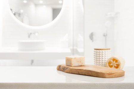 natural wooden soap stand for bathing products in blurred bathroomの写真素材