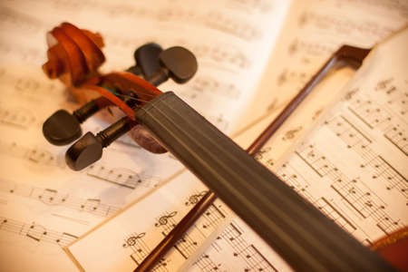 Violin with bow and notesの写真素材