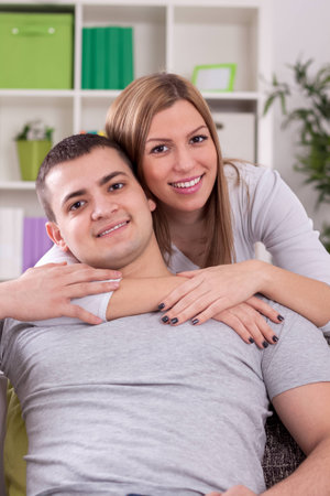 Love couple in living roomの写真素材