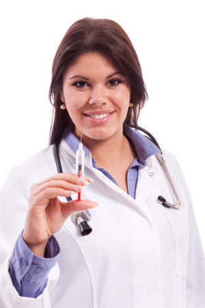 Young Doctor holding syringe isolatedの写真素材