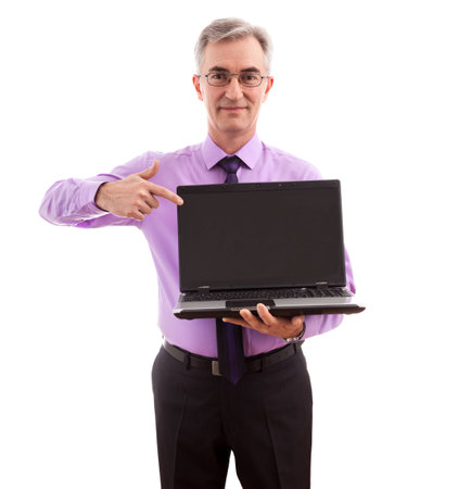 Senior businessman holding lap topの写真素材