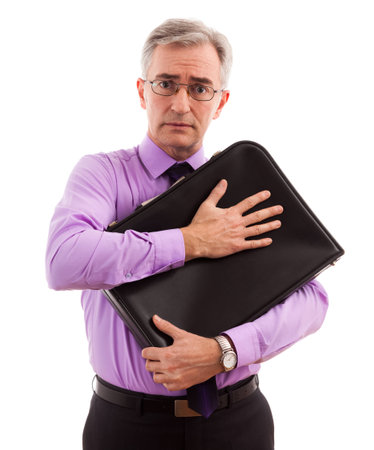 Businessman scared for briefcase and moneyの写真素材