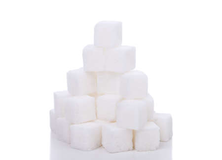 Pile of sugar isolated on whiteの写真素材