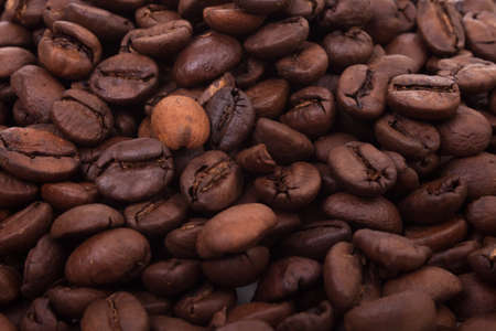 Grains dark coffee background macro
