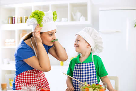 Funny cute family moments in kitchenの写真素材