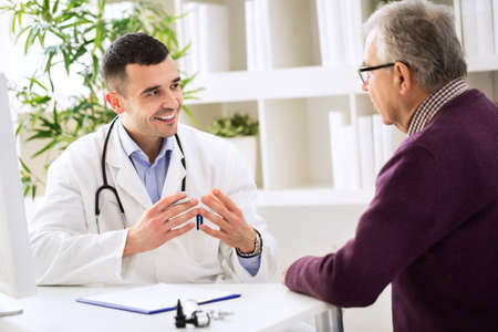 Experienced doctor and patient, medic conceptの写真素材