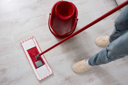 Mopping floor at home close upの写真素材