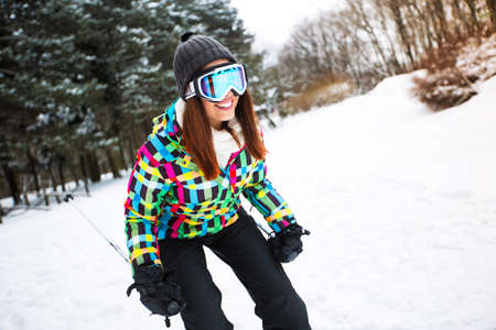 Attractive girl freeride on ski at beautiful high montainの写真素材
