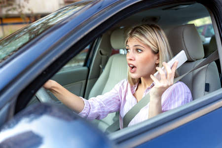 Young woman in shock during driving because of her irresponsible driving