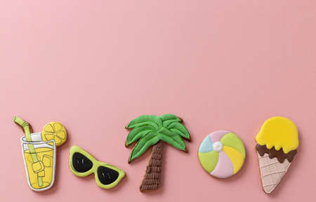 Tropical summertime beach theme motives on sugar icing cookies, sweet and tasty dessert concept