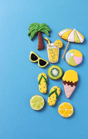 Tropical beach summer theme sweet and delicious sugar cookies, blue background conceptの写真素材