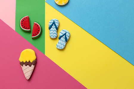 Tasty summer cookies on a colorful background, tropic summertime chilling, pool party cookies conceptの写真素材