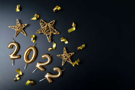 Candles and golden decorationsの写真素材