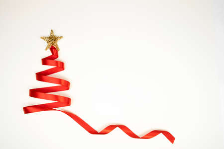 Red Christmas tree with gold star 2の写真素材