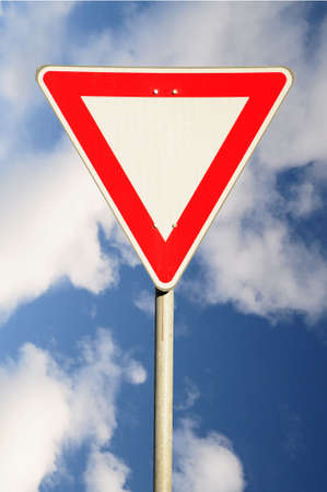 Road sign on cloudy backgroundの写真素材