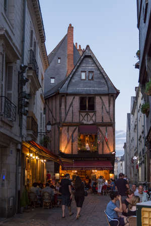 Tours, France - 07 25 2019: Medieval buildings at dusk in the old town of Tourのeditorial素材