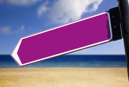 blank sign against a white beachの写真素材