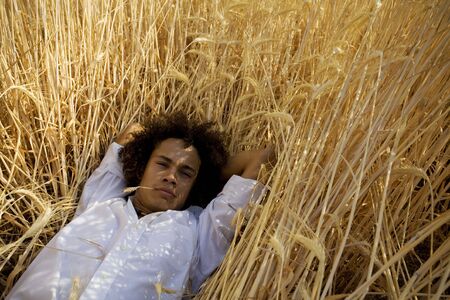  happy guy in a cornfieldの写真素材