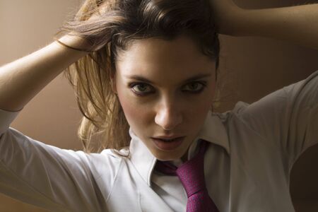 women at work: sick and tired businesswomanの写真素材