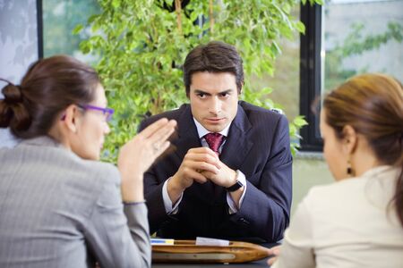 People at work: business team having a meeting