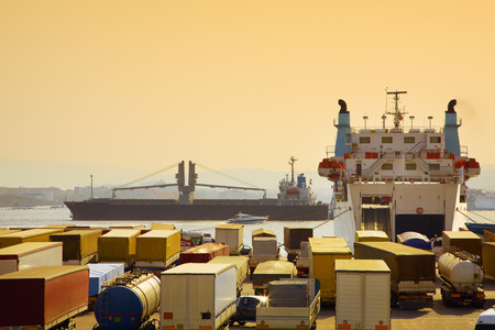 industry and commerce: trucks parked in a harbor 