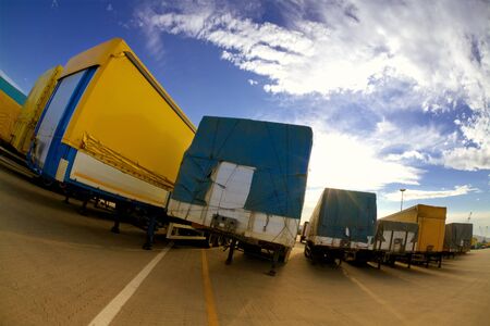 industry and commerce: trucks parked in a harbor