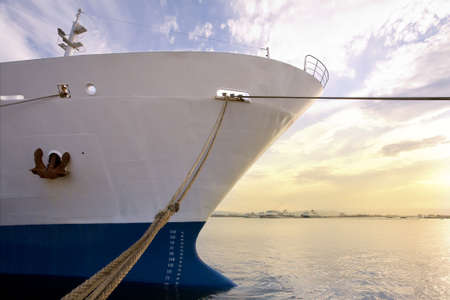 industry and commerce: cargo ship anchored in a harborの写真素材