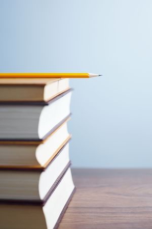 pile of books and pencil on desk. Selective focus, copy spaceの写真素材