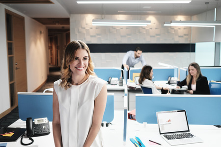 Portrait Of Blonde Business Woman Manager In Coworking Office Spaceの写真素材