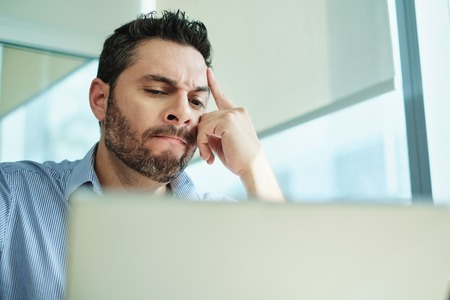 Worried Businessman Got Virus and Data Loss on Laptop Computer