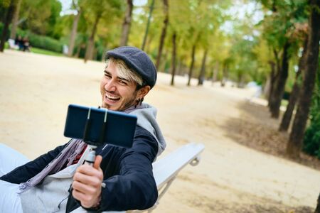 Millennial Man Recording Vlog With Mobile Phone For Social Media