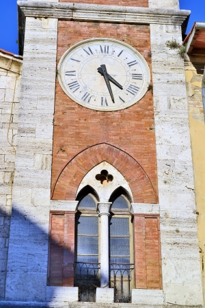 San quirico d Orcia, bell tower with clockの写真素材