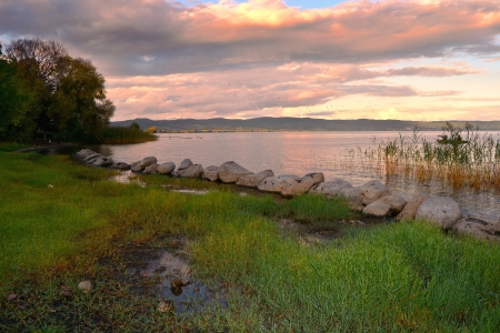 Bolsena lake at sunsetの写真素材