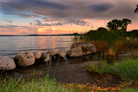 Bolsena lake at sunsetの写真素材