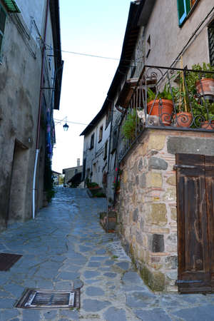 alley of an ancient village of the high tusciaの写真素材