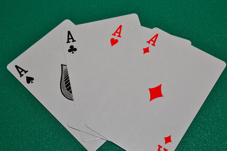 poker cards on green tableの写真素材