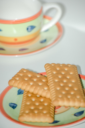 dry biscuits with coffee tazina for breakfast typically Italian, isolated on white background in...