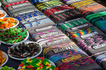 exposure of colorful charm bracelets; textured background