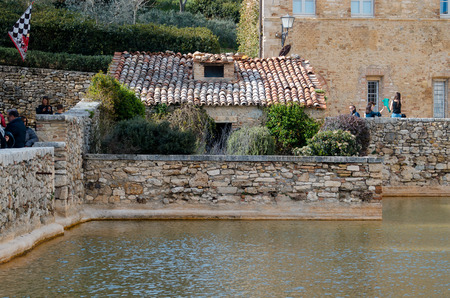 the medieval village of the Bagno Vignoni thermal baths. One of the most visited tourist sites in the Val d'Orcia.の写真素材