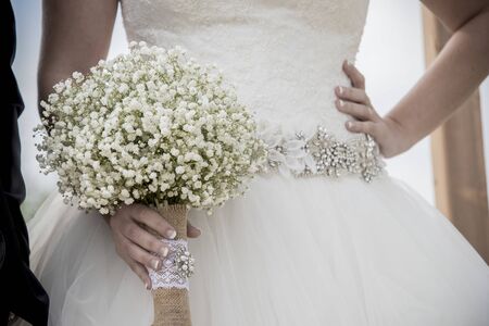 Wedding dress and flowersの写真素材