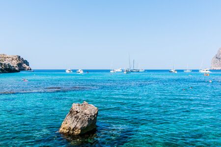 Beach, sea and mountain landscape in Cala San Vicente, Majorcaの写真素材