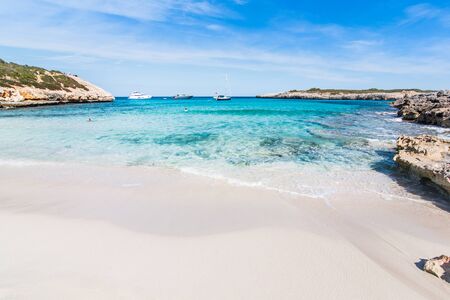 Sky, sea and boats landscape. Cala Varques, Majorcaの写真素材