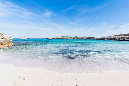 Sky, sea and boats landscape. Cala Varques, Majorcaの写真素材
