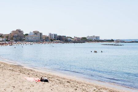 Beach with people and sea landscape in Ciudad Jardin, Majorcaの写真素材