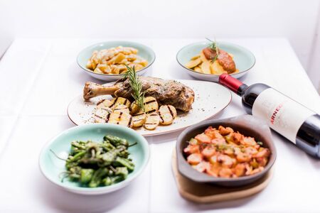 Presentation of food dishes on the tableの写真素材