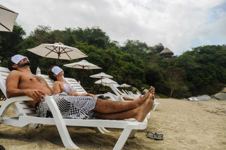 Couple Relaxing at SPA, Tayrona Beach Colombia. South America.Latin American Culture.の写真素材