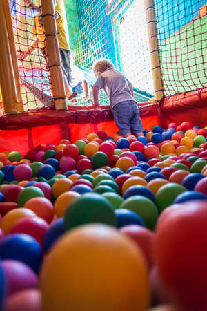 Children Climbing at a playground.の写真素材